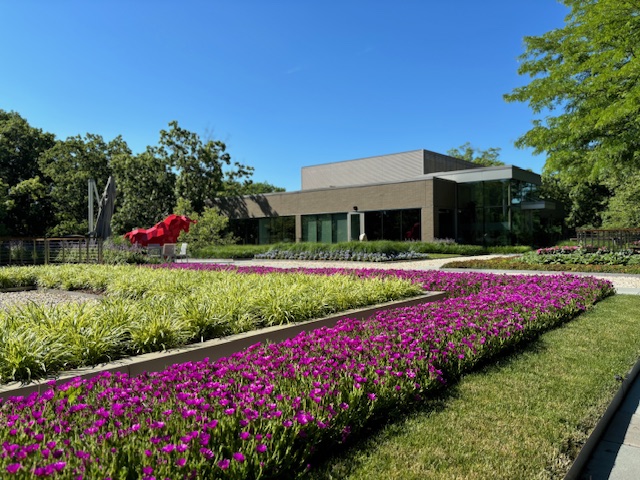 exterior of a commercial building with a well landscaped property
